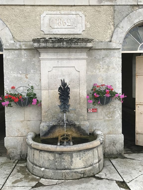 Fountain on the community wash house at Vouécourt